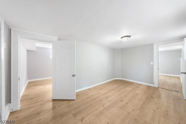 basement featuring light hardwood / wood-style flooring