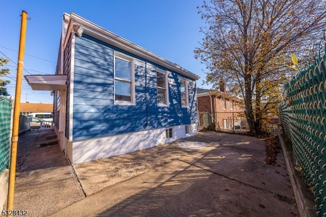 view of home's exterior with a patio area