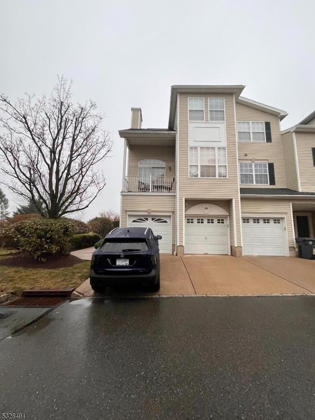 view of front of property featuring a garage