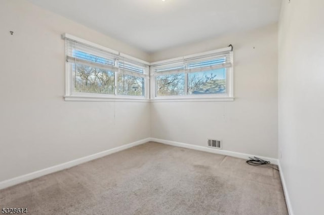 view of carpeted spare room