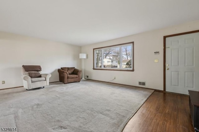 living area with dark wood-type flooring