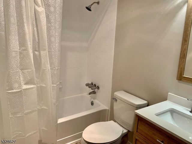 full bathroom with shower / bath combo with shower curtain, vanity, and toilet