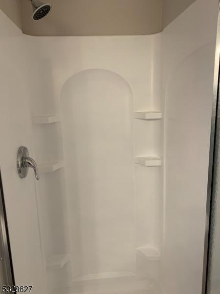 room details featuring walk in shower