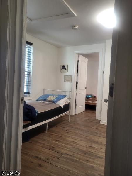 82 Palm St, Newark City, NJ 07106 - bedroom featuring dark wood finished floors