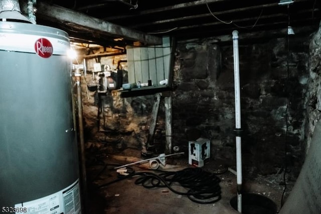 utility room featuring gas water heater