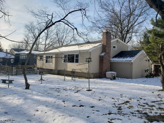 view of snow covered property