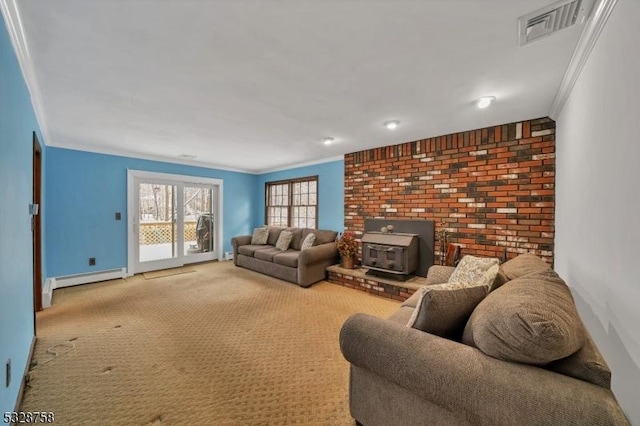 carpeted living room with a wood stove, crown molding, brick wall, and a baseboard radiator