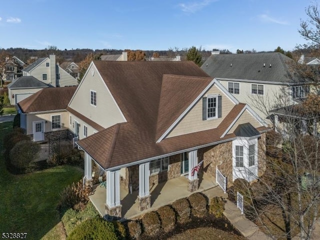 back of property with a patio