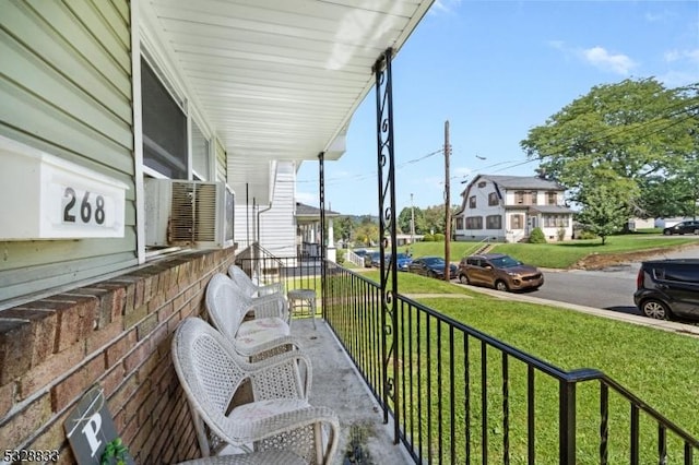 balcony featuring a porch