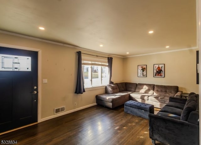 living room featuring ornamental molding and dark wood-type flooring