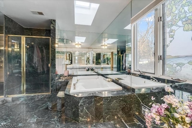 bathroom with a skylight and plus walk in shower