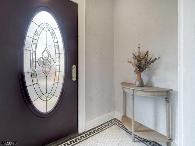 view of tiled foyer entrance