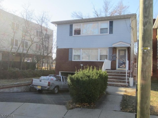 front of property featuring a garage