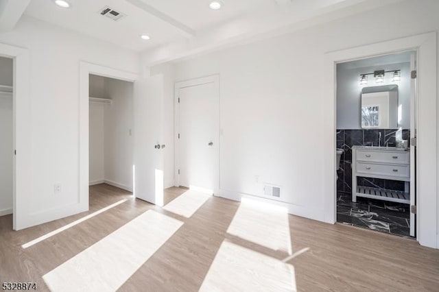 bedroom with light hardwood / wood-style flooring