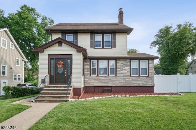 view of front of home featuring a front lawn