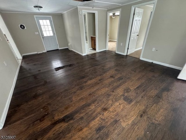 foyer entrance featuring dark hardwood / wood-style floors