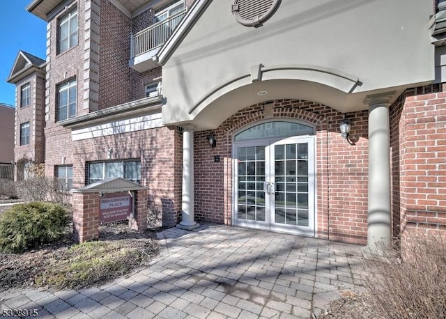 entrance to property featuring french doors