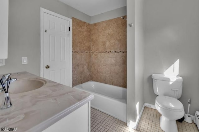 full bathroom featuring vanity, tile patterned floors, tiled shower / bath combo, toilet, and a baseboard radiator