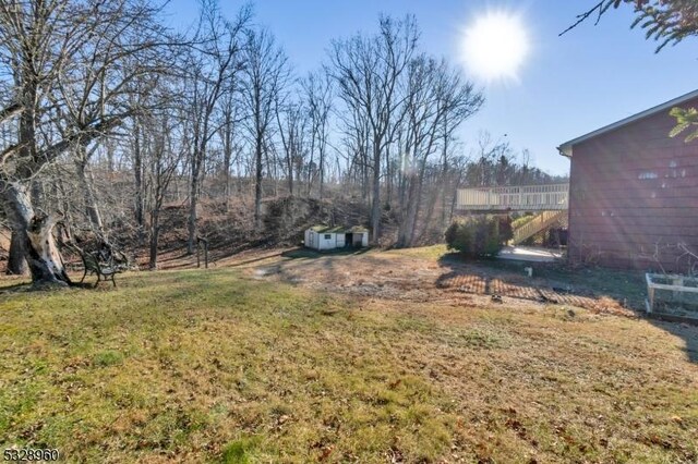 view of yard featuring a deck