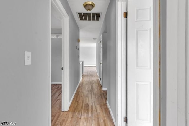 hallway featuring light wood-type flooring