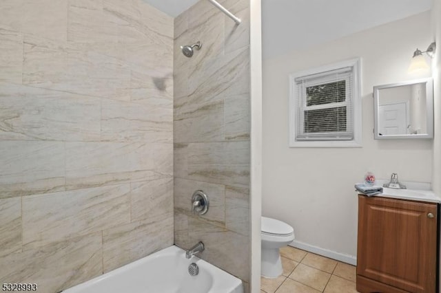 full bathroom with tile patterned floors, vanity, toilet, and tiled shower / bath