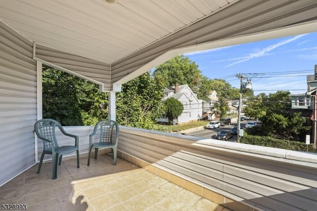 view of patio featuring a porch