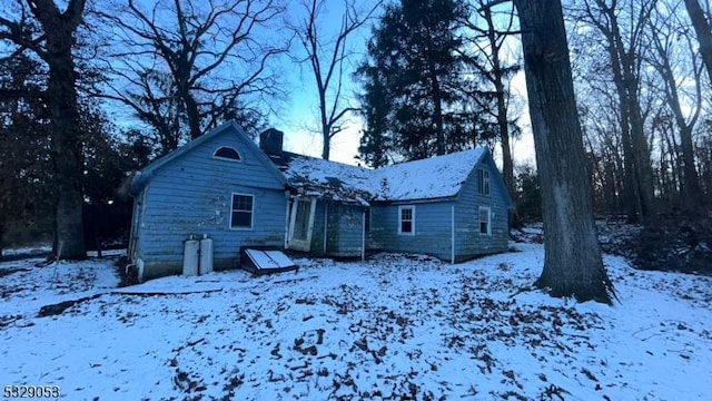 view of snow covered property