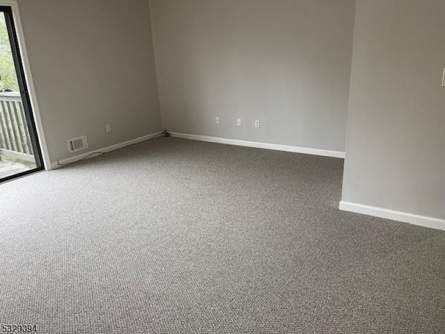 unfurnished room with carpet floors