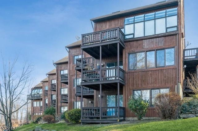 rear view of house with a balcony