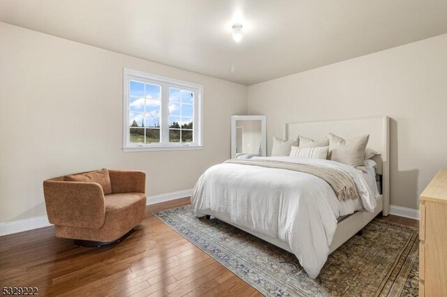 bedroom featuring hardwood / wood-style floors