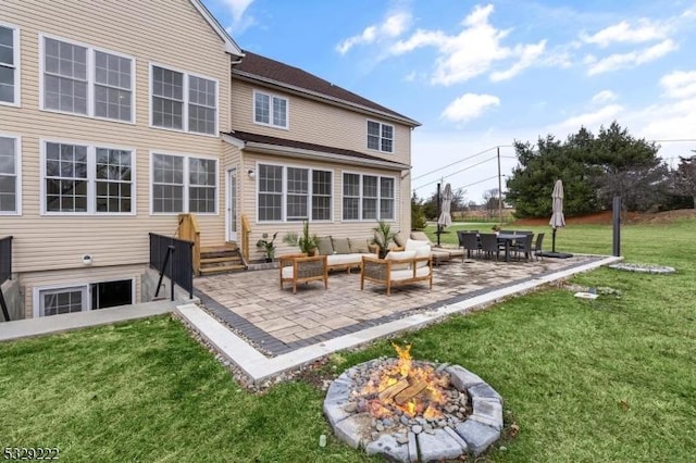 back of property featuring a yard, an outdoor hangout area, and a patio