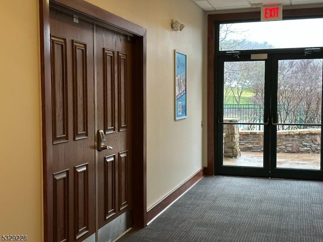 200 State Rt 94 Unit 338, Vernon Twp, NJ 07462 - doorway to outside with dark colored carpet and french doors
