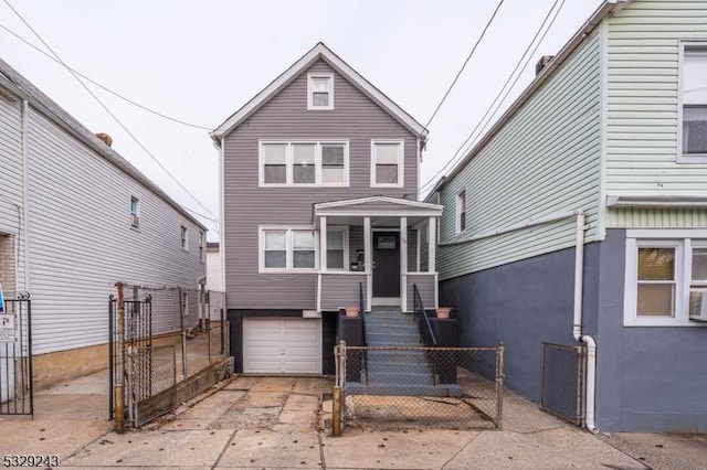 front of property with a garage