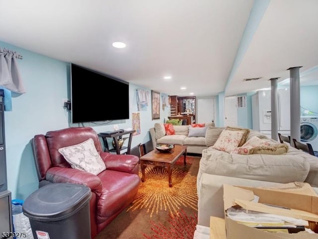 living room featuring washer / clothes dryer