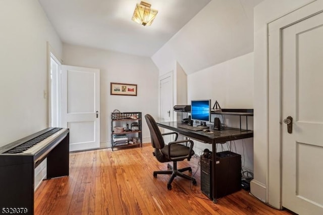 home office featuring hardwood / wood-style flooring