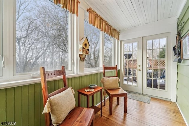 sunroom featuring wooden ceiling