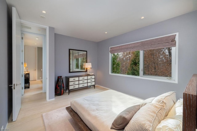 bedroom featuring light hardwood / wood-style flooring