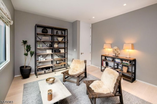 living area featuring light hardwood / wood-style floors