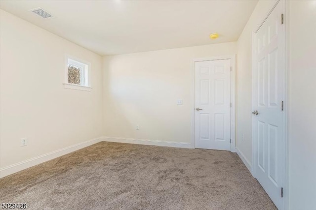 empty room featuring carpet