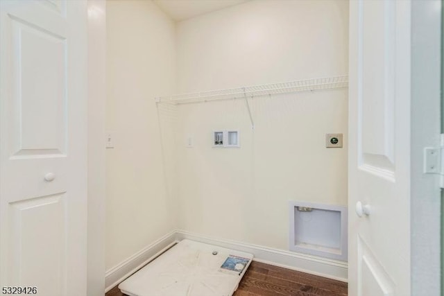 clothes washing area featuring hardwood / wood-style floors, hookup for a washing machine, and hookup for an electric dryer