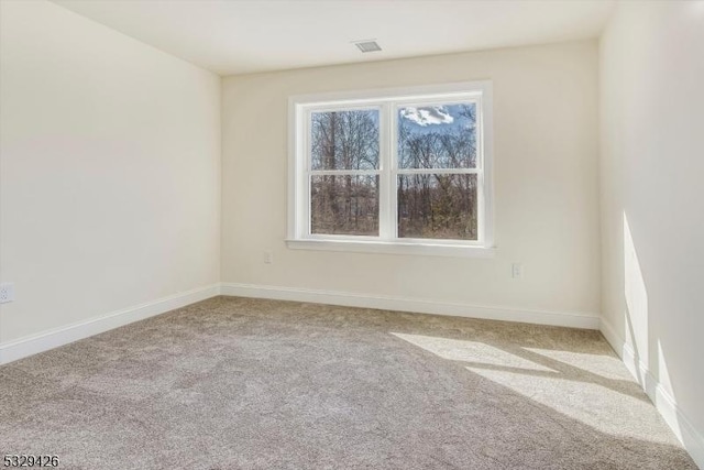 view of carpeted spare room