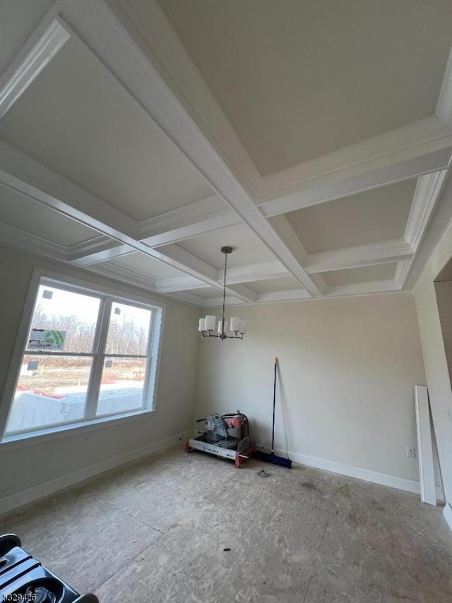 interior space featuring beam ceiling and an inviting chandelier