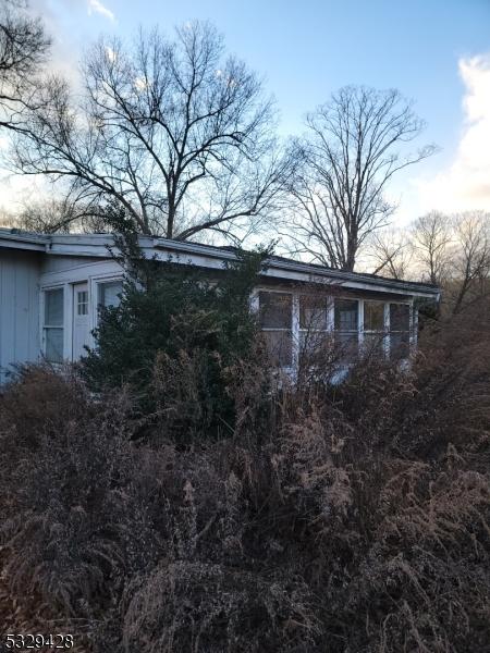 view of property exterior at dusk