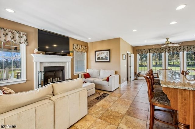 living room with ceiling fan