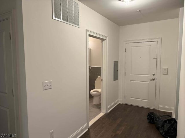 interior space featuring dark hardwood / wood-style floors and electric panel