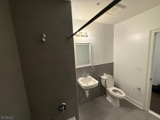 bathroom with toilet and sink