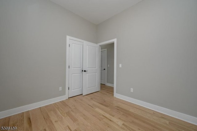 unfurnished room featuring light hardwood / wood-style floors