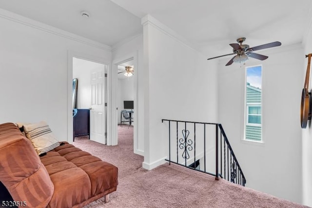 413B Lakeside Blvd, Hopatcong Boro, NJ 07843 - sitting room with carpet floors, an upstairs landing, ceiling fan, and crown molding