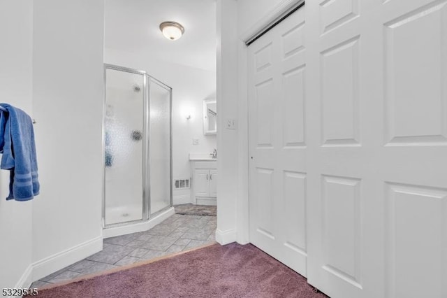 413B Lakeside Blvd, Hopatcong Boro, NJ 07843 - full bath featuring a shower stall, baseboards, and vanity
