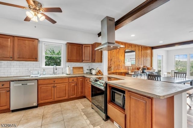 413B Lakeside Blvd, Hopatcong Boro, NJ 07843 - kitchen featuring appliances with stainless steel finishes, island range hood, a sink, a peninsula, and decorative backsplash